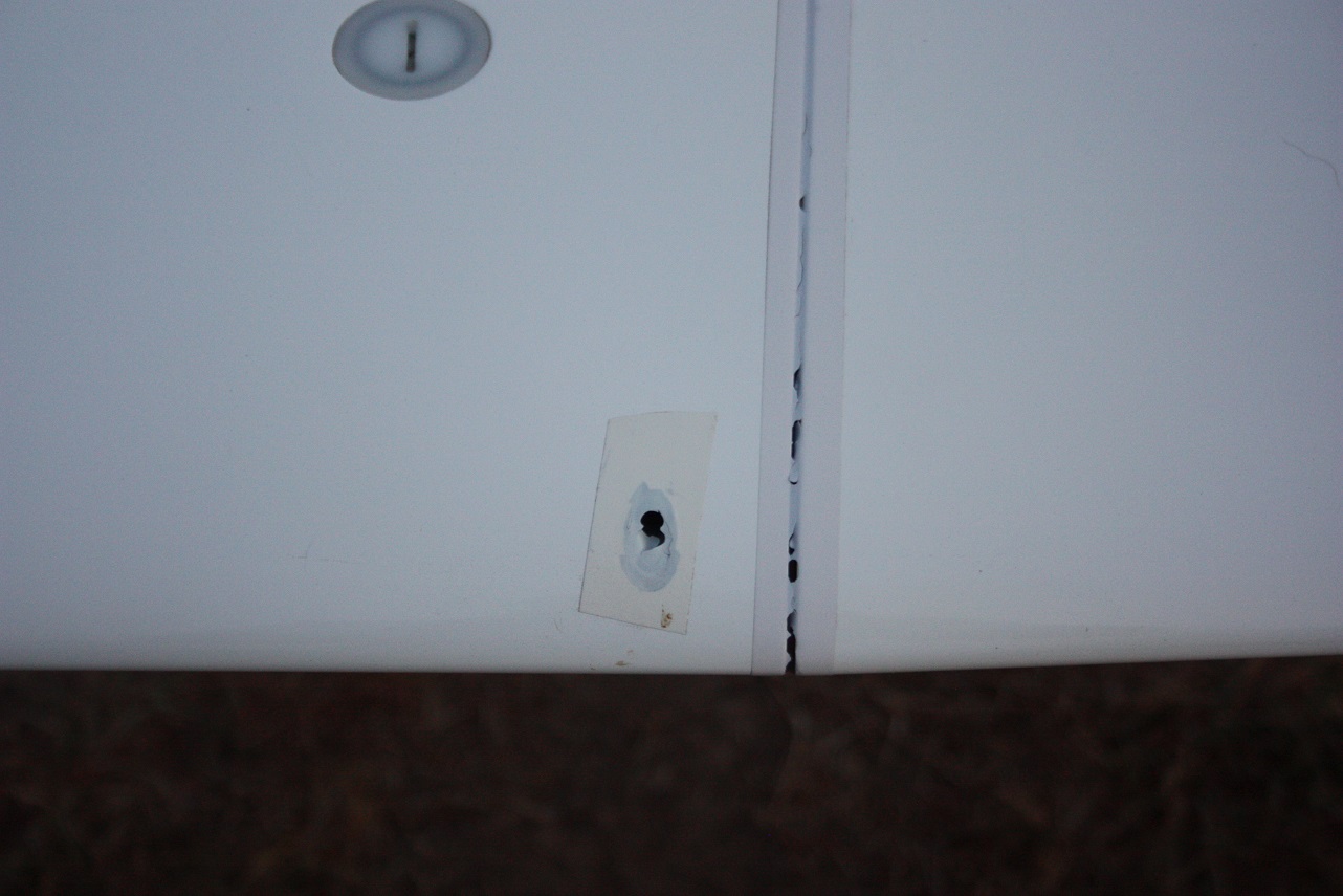 The damage done to tape on the wings having flown through a large Texas storm to a TP during WGC 2012